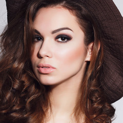 Fototapeta premium portrait of a beautiful brunette girl in the studio