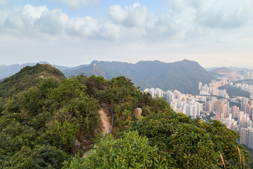 View of Lion Rock Country Park and New Kowloon in Hong Kong from above from the Lion Rock in Hong Kong, China.