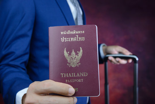 businessman showing passport, travel aboard, business trip