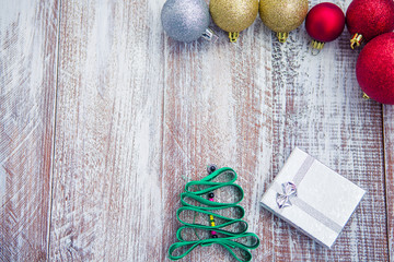 christmas balls isolated on a wooden background