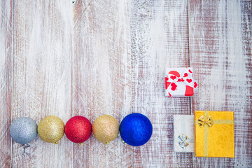 christmas balls isolated on a wooden background