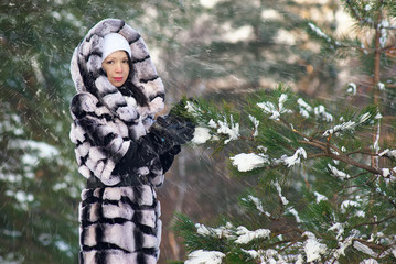 Happy young woman in winter