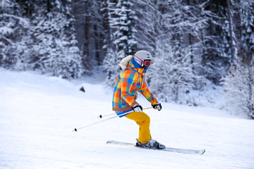 Fototapeta na wymiar Ski rider in motion winter mountains