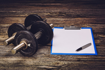 Blank paper page as a background for fitness conpept