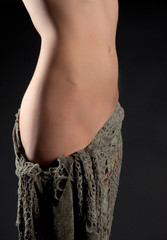 Woman's Torso With Fabric Wrapped Around Hips