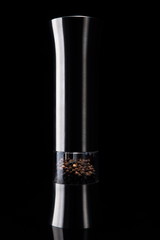 pepper mill isolated on black © Hrab 67