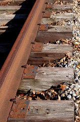 Rusty train tracks.  Worn and weathered railway.