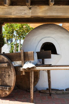 Close-up of replicated stove and wooden construction