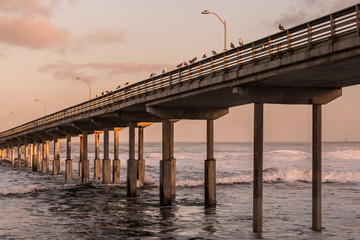 Fototapeta premium High tide at Ocean Beach fishing pier in San Diego, California. 