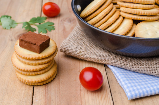 Crackers biscuits on burlap sack background
