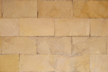 Brown stone wall for background design.