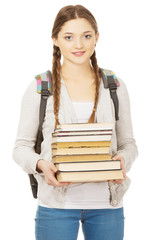 Beautiful teenager with backpack and books.