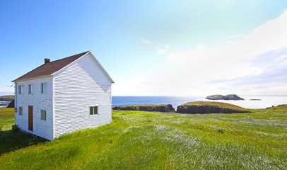 Fototapeta na wymiar Abandoned House in Newfoundland, Canada. Rugged landscape
