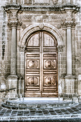 Wooden door stone architrave HDR Corinthian columns, ornate