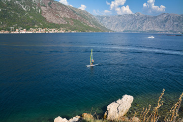 Windsurfer crosses the Bay of Kotor.