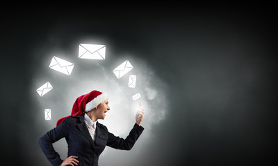 Santa woman having mobile dialogue