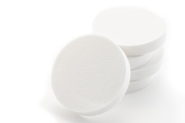 Cosmetic white circle sponges.