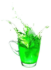 Splashing of green soda with ice in glass on white background.
