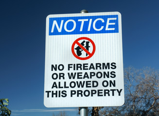 No Firearms or Weapons Sign - 101089717