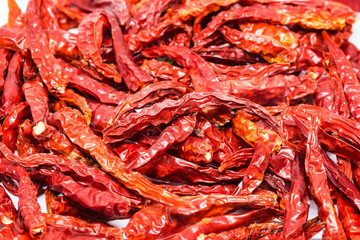 Dried red hot peppers isolated on white background