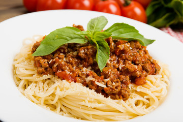 Pasta with meat, tomato sauce and vegetables