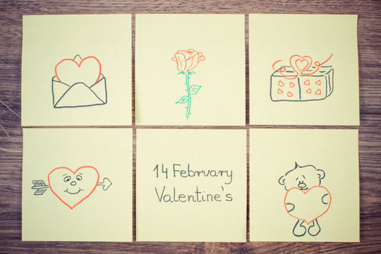 Vintage photo, Symbols of Valentines Day drawn on paper, symbol of love