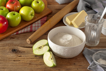 Flour in a bowl on a wooden table