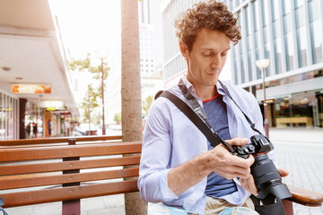 Male photographer taking picture