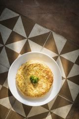 spanish tortilla traditional omelet on rustic tiles