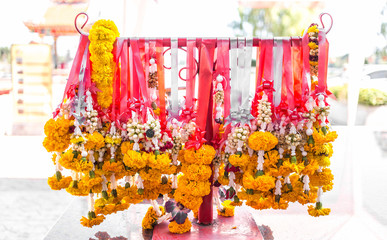 Flower garlands in chinese temple