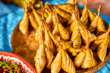 Healthy Asian Food. Closeup Of Thai Dessert ( Sweets ) Ketupat Daun Palas ( Rice Dumpling With Palm Leaves ) At Farmers Market In Thailand, Asia. Thai Dishes And Cuisine. Travel And Tourism.