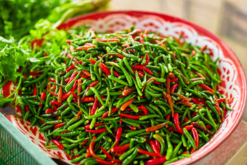 Vegetables. Close Up Of Organic Spicy Hot Red And Green Chili Peppers In The Farmers Market In Thailand, Asia. Nutrition. Healthy Food Ingridient. Spices.