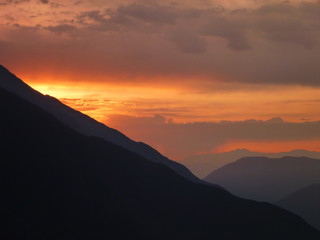 beautiful romantic sunset at peruvian andes