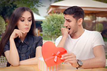 Nervous Boyfriend presenting his Gift to his Picky Girlfriend