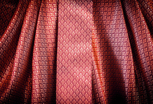 red  thai pattern textile