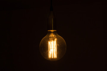 Fototapeta na wymiar Big lightbulb turned on