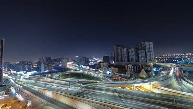 Cityscape of Ajman from rooftop at night timelapse. Ajman is the capital of the emirate of Ajman in the United Arab Emirates.
