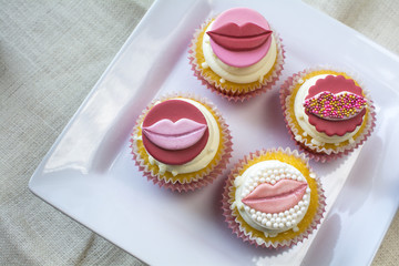 Valentine's french vanilla cupcake with colorful lips  fondant