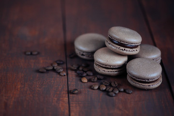 French macaroons with coffee beans . Selective focus