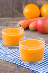 Smoothie with orange, apple and carrots