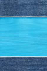 Fototapeta premium blue jeans texture on wood