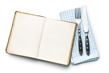 vintage book and cutlery
