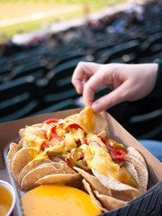 Person Eating Sports Stadium Food