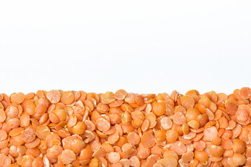 Red lentils background.