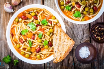 Minestrone soup with whole grain toasts