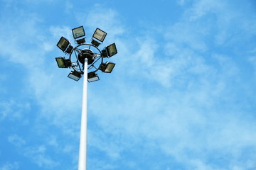 Blue-sky and white cloud and Lamp post spot light