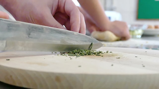 Shredding rosemary in slow motion, Food Preparation by Chef, Slow Motion Video Clip