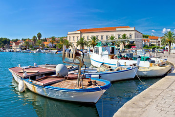 Fototapeta na wymiar Fishing boat in Stari Grad harbor