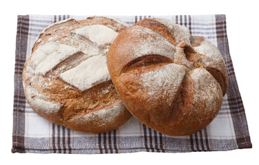 .Bread lying on a napkin.