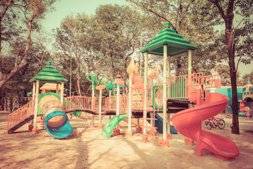 Retro kid playground toy for kindergarten student leisure and recreation activity with toy and slider leftover in the park in childhood color style